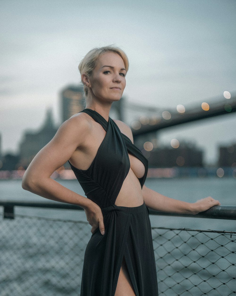A black occasion dress styled with minimal jewellery